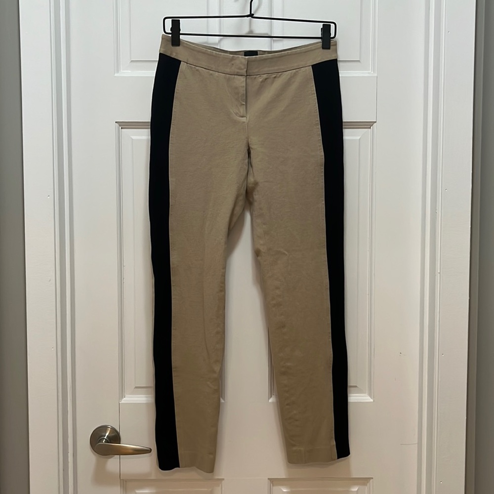 Saks Fifth Avenue Black Label khaki pants with black accent stripe on each leg.
